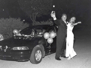 Bride and Groom by car